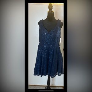 Brand new dress tag is still attached.